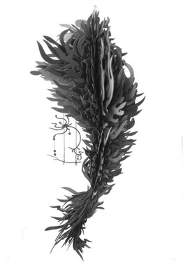 A hanging sculpture made to look like a plume of feathers or smoke rising upward.