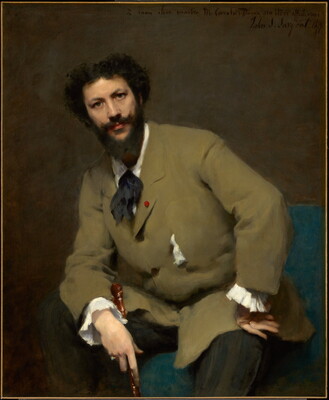 An oil painting of a seated White man with dark curly hair, mustache, and full beard, wearing a beige overcoat and leaning on one elbow which rests on his knee.