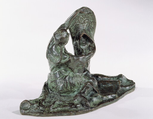 A bronze sculpture of a Native American woman looking at a child propped upright in a cradleboard.