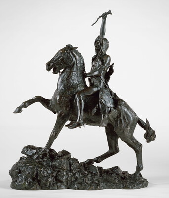 A bronze sculpture of a man on horseback holding a piece of scalp and hair in his hand thrusted above his head triumphantly.