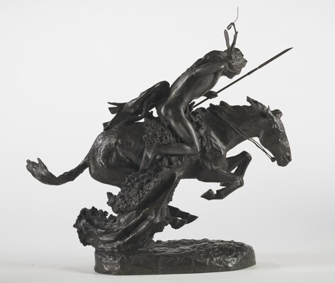 A bronze sculpture of an Indigenous person crouched on a running horse holding a spear and a whip.