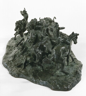 A bronze sculpture of two Native men, one with a spear and the other with a bow, on horseback circling a group of bison.