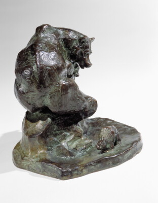 A bronze sculpture of a mother bear and her two cubs huddled on a rock as a porcupine walks past.