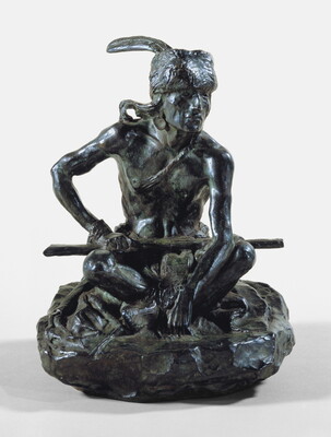 A bronze sculpture of an Indigenous man seated on the ground with a rifle resting across his lap.