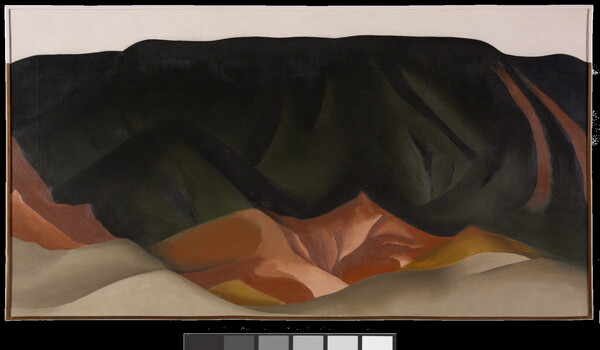 An oil painting of dark mountains cascading down the canvas in various heights and colors from a light pink sky.