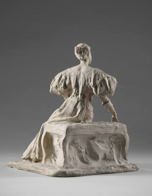 A white, plaster sculpture of a young woman sitting on a bench in a long dress with puffy sleeves.