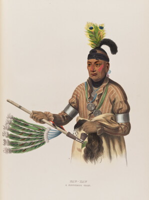 A color print of a Native American man with two peacock feathers on his head, a painted face, several medals hanging around his neck, holding a ceremonial pipe decorated with feathers.