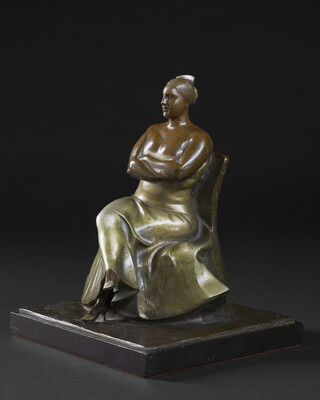 A bronze sculpture of a woman wearing an evening gown sitting with her legs and arms crossed.
