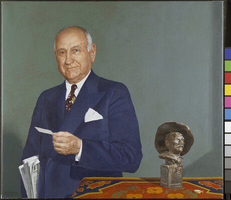 An oil painting of an older man holding newspapers under his arm and standing next to a table on which sits a Remington sculpture.
