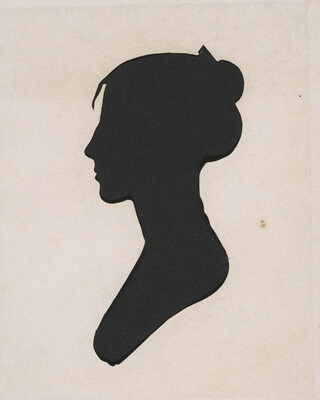 A silhouette of a woman in profile with her hair pulled into a bun.