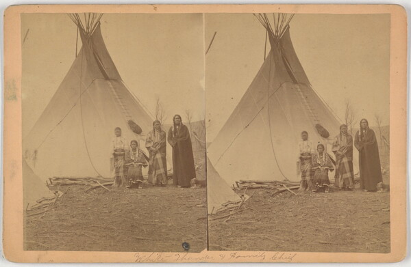 A sepia-toned stereograph of a Native American family standing in front of a tipi.