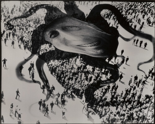 A black-and-white photograph of a distorted face superimposed over the shadow of an octopus hovering above a crowd of people.