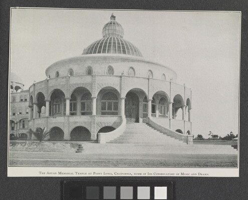 A black-and-white photograph of a circular building adorned with arches, windows, and a dome.