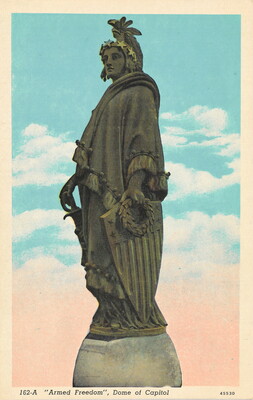 A color postcard of a sculpted figure holding a sword and shield.