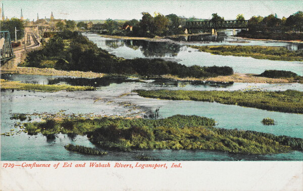 A color postcard of a marshy area dotted with little wooded islands, several bridges over the water, and train tracks off to the side.