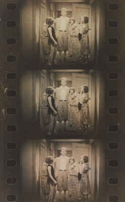 A sepia-toned film reel of three identical photographs of a White man wearing glasses posing with three White women.