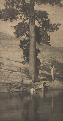 A sepia-toned photograph of three nude women bathing in a pool of water under a large tree.