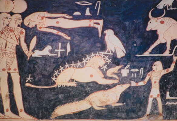 A color photograph of a mural with white and red hieroglyphs featuring people, animals, and other symbols.