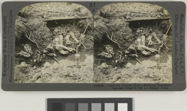 Two almost identical black-and-white photographs side by side of human remains in a muddy war trench.