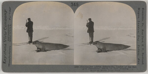 Two almost identical side-by-side black-and-white photographs of a man standing next to a seal in a snowy landscape.