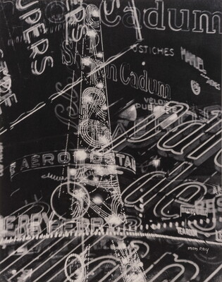 A black-and-white photograph of overlapping commercial neon signs.