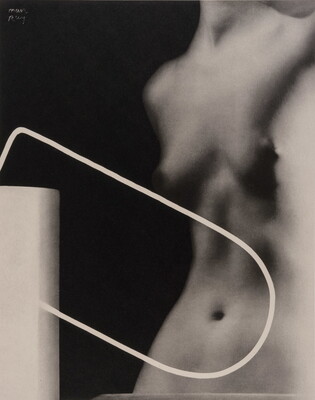 An abstract black-and-white photograph of the torso of a nude woman layered behind the silhouette of an electric water heater.