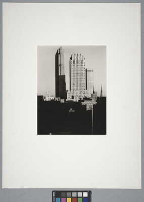 A black-and-white photograph of skyscrapers in New York City. 