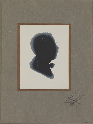 A black-and-white silhouette of the profile of the head and neck of a man with a bow tie.