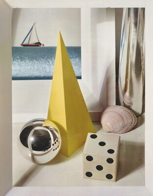 A color still life photograph of a painting of a sailboat, a tall yellow pyramid, a pink seashell, a die, and a silver ball that reflects the die next to it.