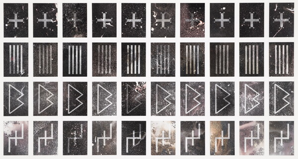 A black-and-white photograph of four rows of 10 symbols: the top row is plus symbols, second is four vertical lines, third looks like a pointed capital B, the fourth row looks like a plus sign with vertical lines coming off of its horizontal bar.