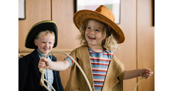Two children at the Carter dressed in costumes.