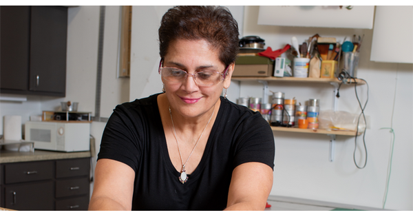 Artist Anila Agha working in her studio.