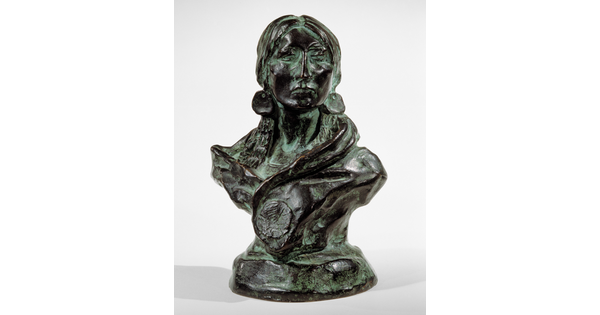 A bronze sculpture with a slight green patina of the bust of an American Indian woman.