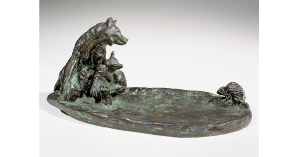 A bronze sculpture of a mother bear and her cub keeping a safe distance from a porcupine.