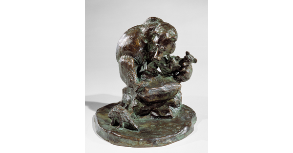 A bronze sculpture of a mother bear and her two cubs huddled on a rock as a porcupine walks past.