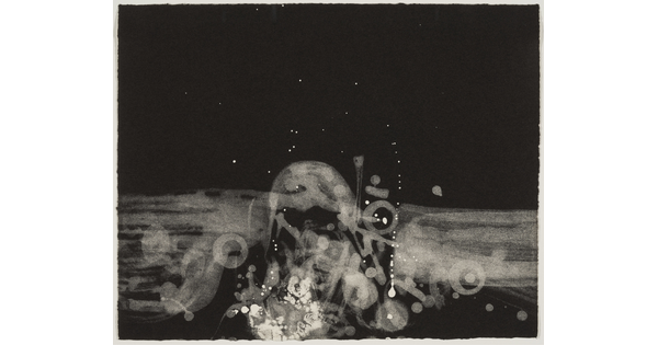 An abstract print of white swirls and dots on the bottom half of the page against a black background.