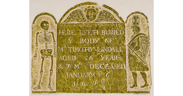 A print of a stone rubbing of a tombstone that includes text, images of a skeleton, and a winged man with an hourglass on his head.<br />
