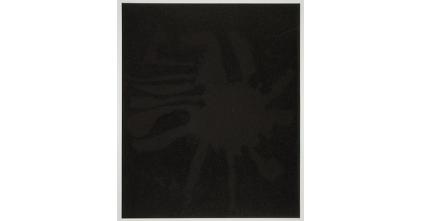 An abstract color print of a very dark brown splatter shape against a black background.