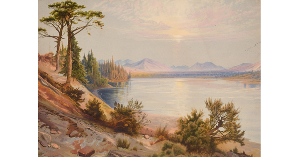 A color landscape print of a rocky shore beside water with craggy mountains in the distance.