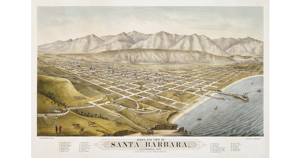 A color print of an aerial view of a gridded city along a shoreline with mountains in the distance.