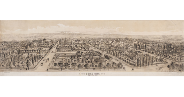 A sepia-toned print of an aerial view of a city showing the city blocks and buildings and mountains in the distance.