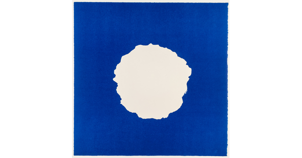 An abstract color print of ragged, white circle on a blue background.