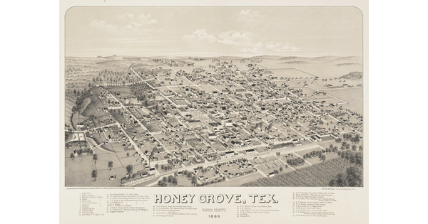 A black-and-white print of a bird's eye view of a town showing its grid of streets and a railroad in the foreground.