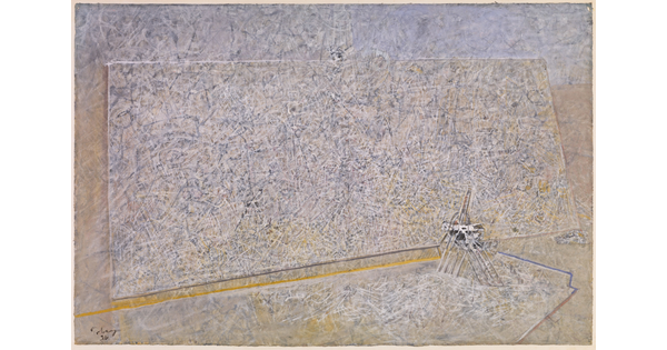 An abstract painting of a large-scale canvas leaning against a wall.