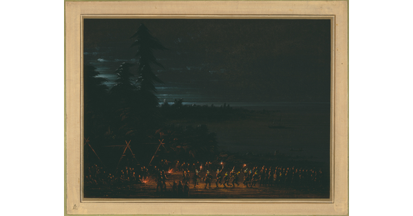 A night scene of Indigenous people gathered together for a torch-lit ceremony.