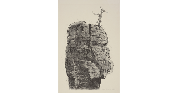 A black-and-white print of a large boulder with a vertical crack in the middle and a leafless tree on the top.