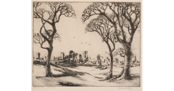 A black-and-white print of a city skyline in the distance framed by three trees in the foreground.