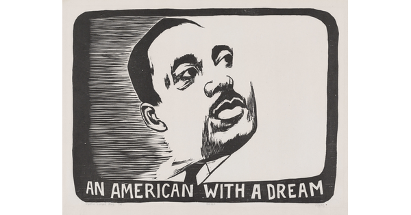 A black-and-white portrait print of the face of a Black man with a mustache above the words &quot;An American with a Dream.&quot;