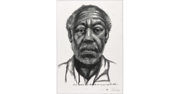 A black-and-white print of a sketch of a balding Black man who looks out at the viewer.