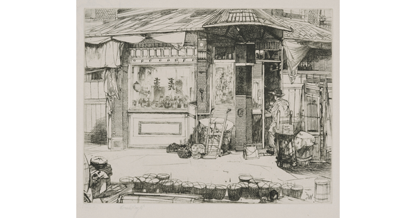 A black-and-white print of a person seated at work in front of a building with Asian details; a line of baskets on the street in the foreground.
